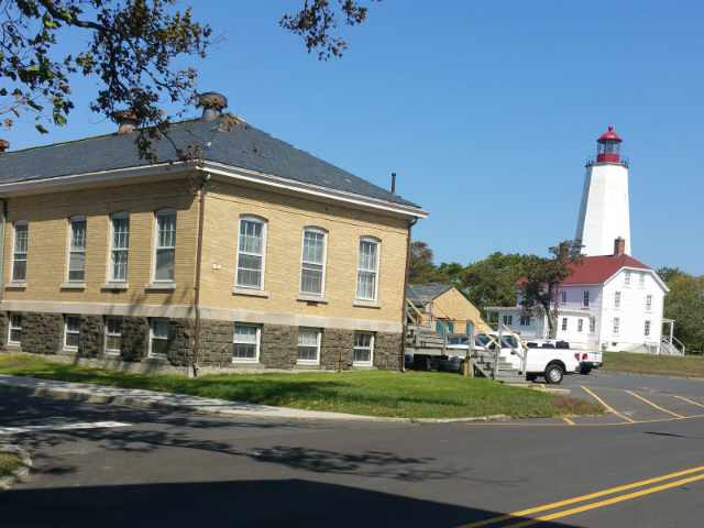 Outside of McFly's with lighthouse in background